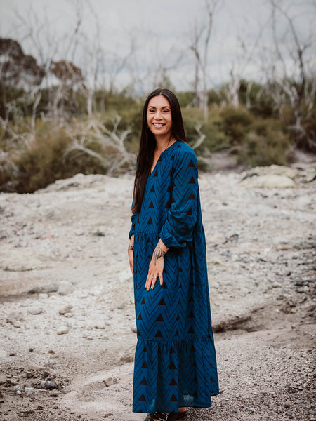 Māori Inspired Designed Print in Black on a Blue Long sleeve Panekoti by Māori Fashion Designer Adrienne Whitewood