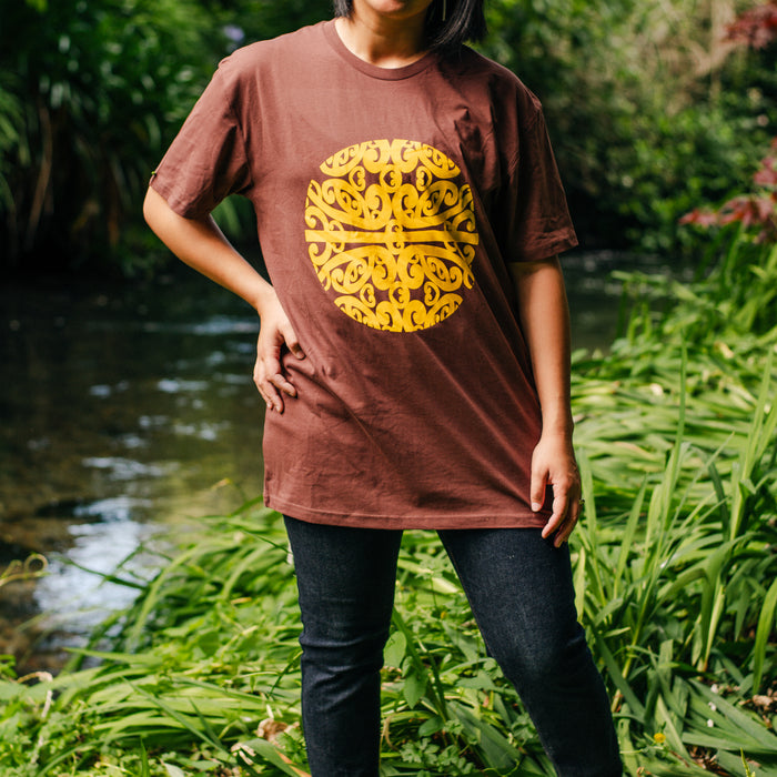 Māori Inspired Yellow Koru Design Tee in Chestnut by Maori Fashion Designer Adrienne Whitewood