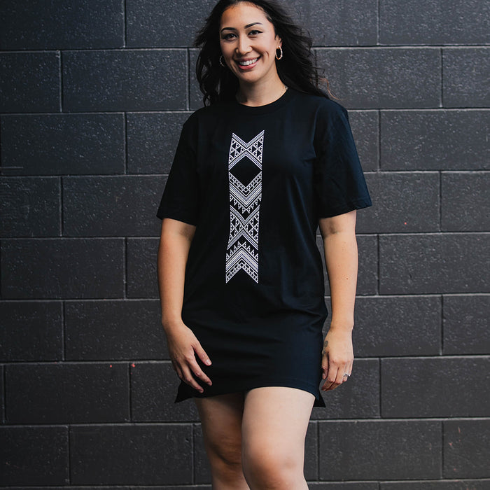 Māori Inspired Taniko Hou Print in white on a Black oversized Tee Dress designed by Rotorua Fashion Designer Adrienne Whitewood
