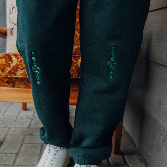Embroidered Taniko Roa Track Pant - Pine Green