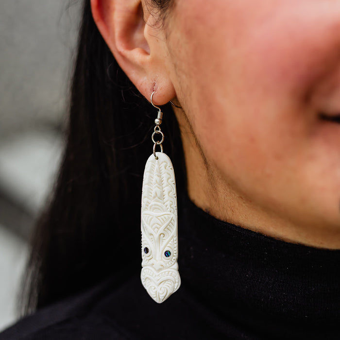 Bone Toki Earrings with Tiki Pattern