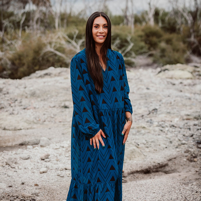 Māori Inspired Designed Print in Black on a Blue Long sleeve Panekoti by Māori Fashion Designer Adrienne Whitewood