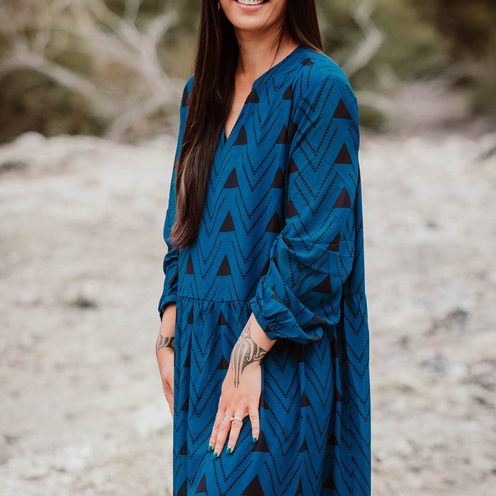 Māori Inspired Designed Print in Black on a Blue Dress by Māori Fashion Designer Adrienne Whitewood 