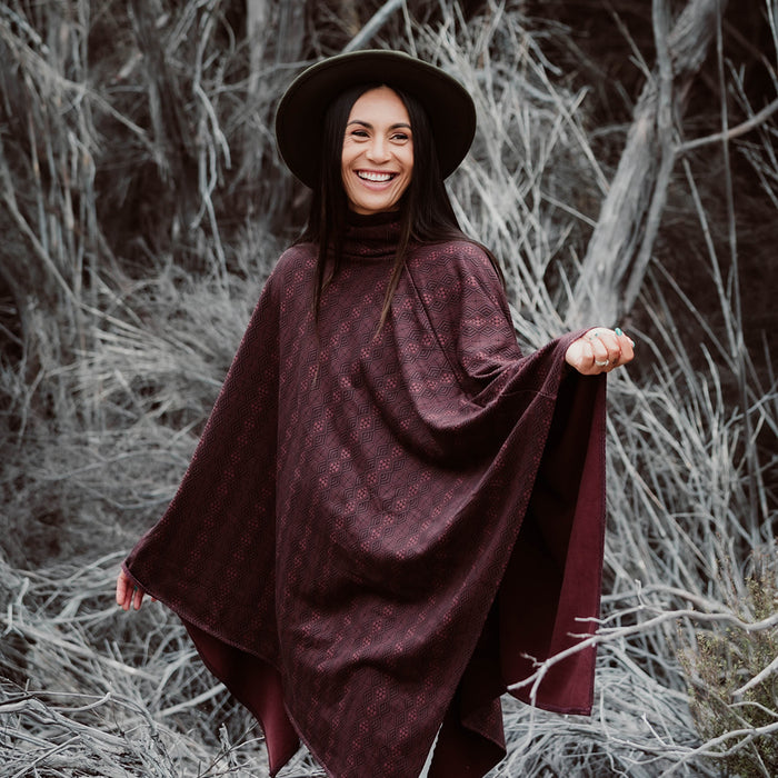 Maori Inspired Design on Burgundy Organic Cotton Poncho by Rotorua Fashion Designer Adrienne Whitewood