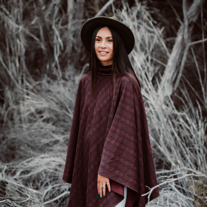 Maori Inspired Design on Burgundy Organic Cotton Poncho by Rotorua Fashion Designer Adrienne Whitewood