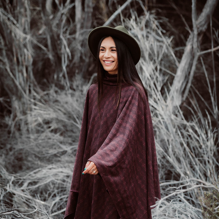 Maori Inspired Design on Burgundy Organic Cotton Poncho by Aotearoa Fashion Designer Adrienne Whitewood