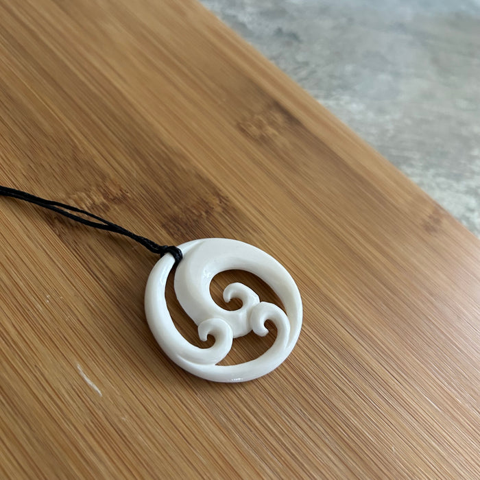 Bone Triple Koru Pendant