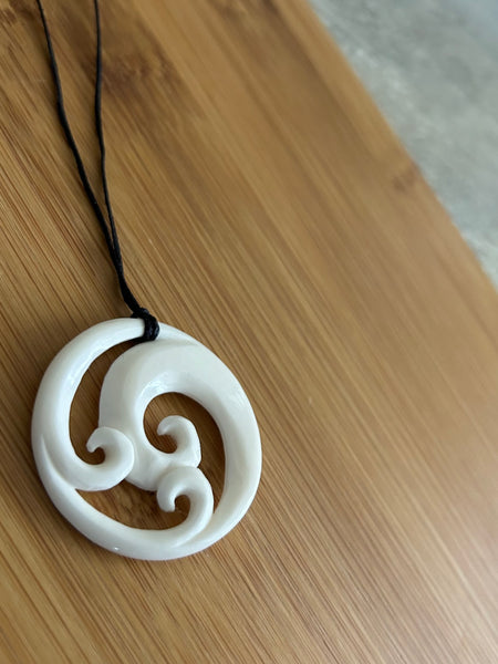 Bone Triple Koru Pendant