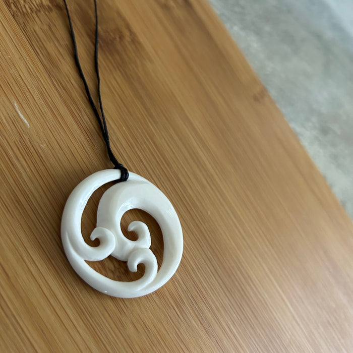 Bone Triple Koru Pendant