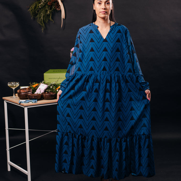 Māori Inspired Designed Print in Black on a Blue Long sleeve Dress by Māori Fashion Designer Adrienne Whitewood